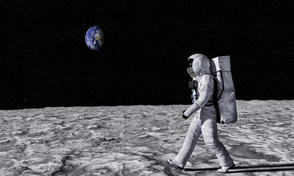 Astronaut walking across the lunar surface, symbolizing space exploration’s impact on everyday tech