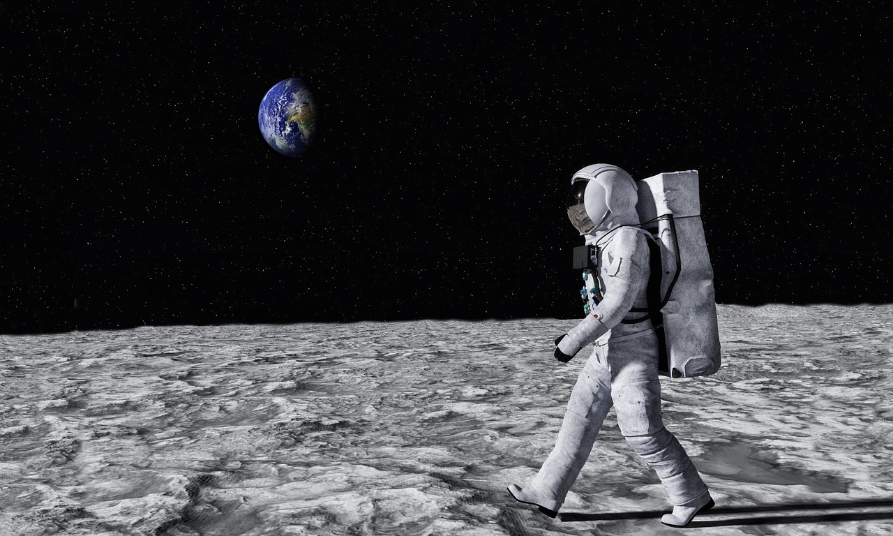 Astronaut walking across the lunar surface, symbolizing space exploration’s impact on everyday tech