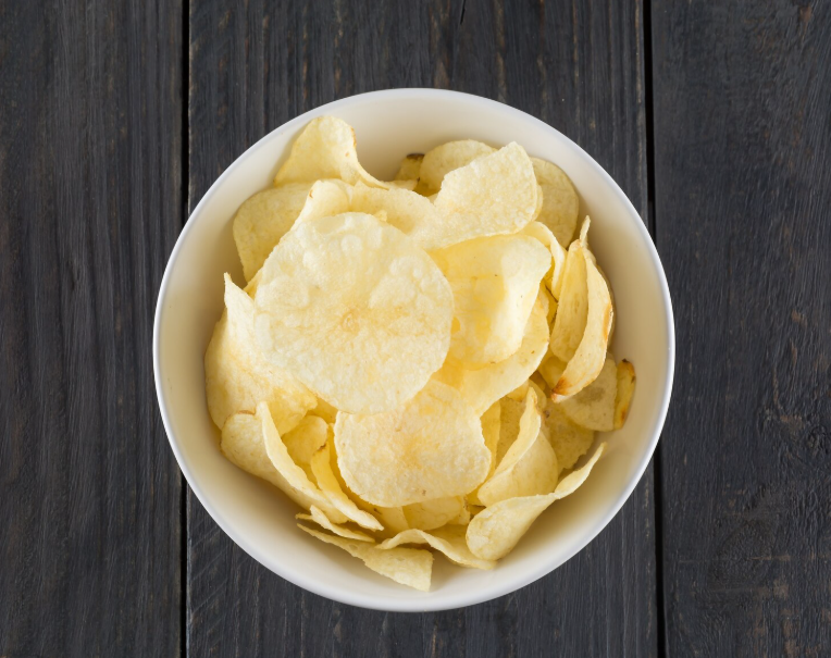 Paper-thin potato chips created by chef George Crum