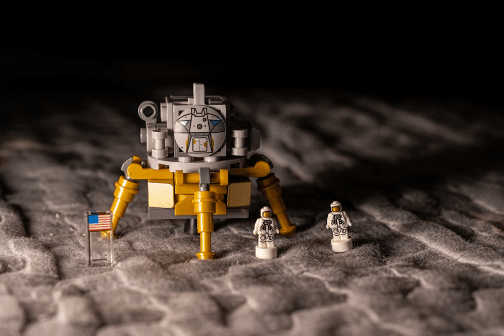 LEGO lunar module with two astronaut minifigures. illustrating the NASA and LEGO partnership
