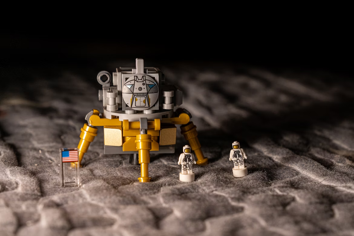 LEGO lunar module with two astronaut minifigures. illustrating the NASA and LEGO partnership