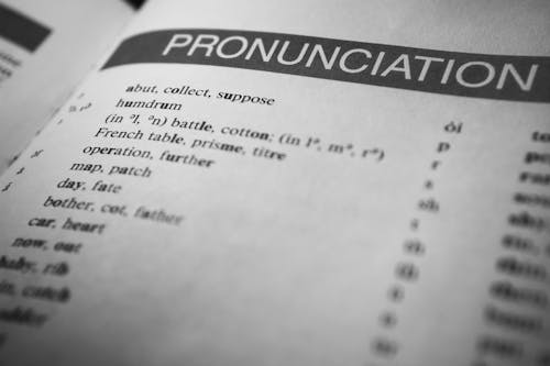 Close-up of a dictionary pronunciation guide with phonetic symbols