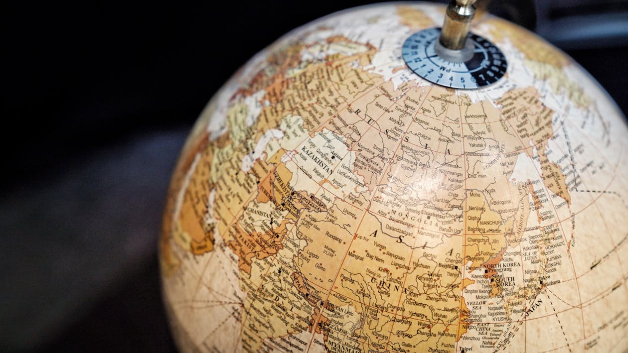 Close-up of a vintage globe evoking shifting borders and countries that no longer exist.